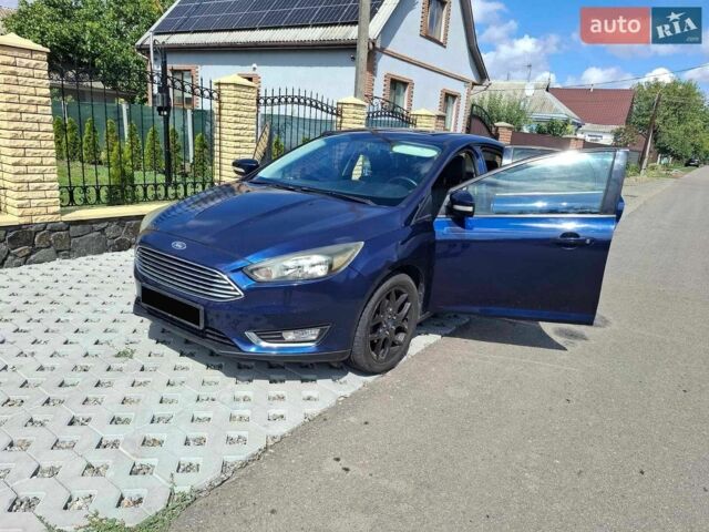 Синій Форд Фокус, об'ємом двигуна 2 л та пробігом 125 тис. км за 8000 $, фото 1 на Automoto.ua