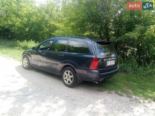 Синий Форд Фокус, объемом двигателя 1.75 л и пробегом 250 тыс. км за 1750 $, фото 1 на Automoto.ua