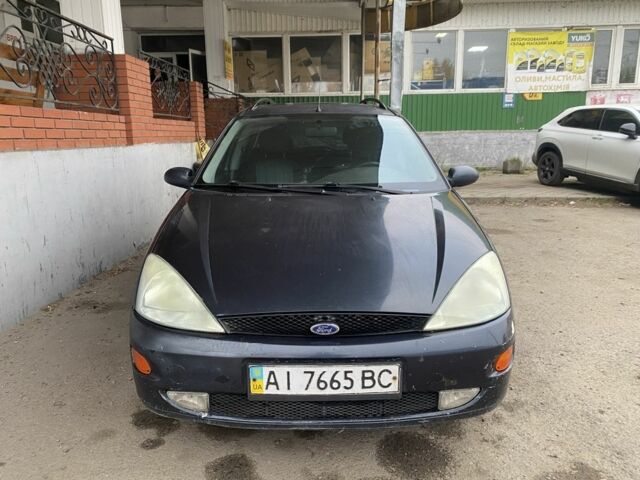 Синий Форд Фокус, объемом двигателя 1.6 л и пробегом 414 тыс. км за 2500 $, фото 1 на Automoto.ua