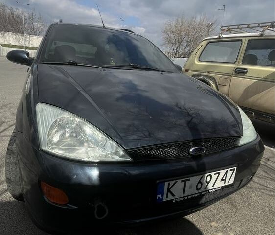 Синий Форд Фокус, объемом двигателя 1.8 л и пробегом 300 тыс. км за 1500 $, фото 1 на Automoto.ua