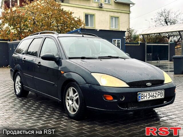 Синий Форд Фокус, объемом двигателя 1.8 л и пробегом 300 тыс. км за 2450 $, фото 1 на Automoto.ua