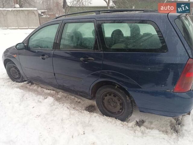 Синий Форд Фокус, объемом двигателя 1.8 л и пробегом 210 тыс. км за 1250 $, фото 1 на Automoto.ua