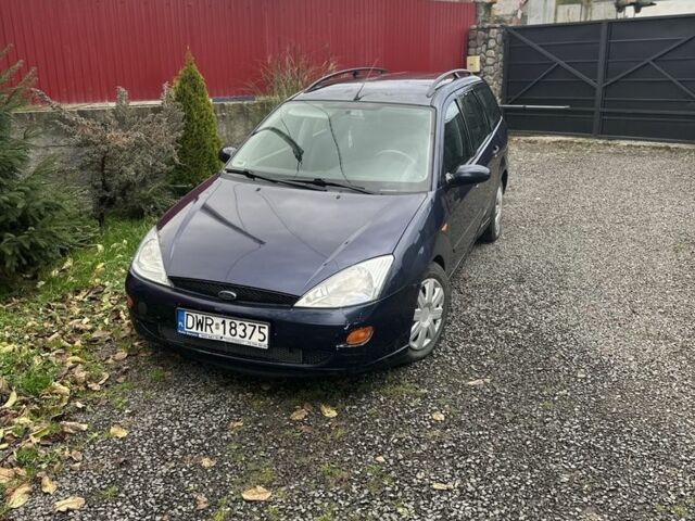 Синий Форд Фокус, объемом двигателя 1.8 л и пробегом 300 тыс. км за 1300 $, фото 1 на Automoto.ua