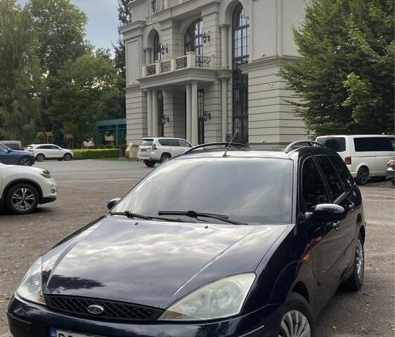 Синий Форд Фокус, объемом двигателя 1.8 л и пробегом 325 тыс. км за 2599 $, фото 1 на Automoto.ua