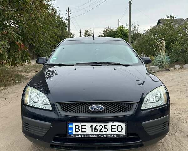 Синий Форд Фокус, объемом двигателя 1.39 л и пробегом 180 тыс. км за 4500 $, фото 1 на Automoto.ua