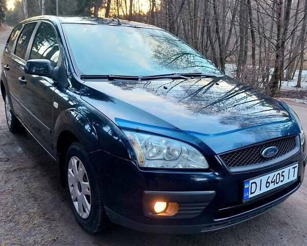 Синий Форд Фокус, объемом двигателя 1.4 л и пробегом 154 тыс. км за 4800 $, фото 1 на Automoto.ua