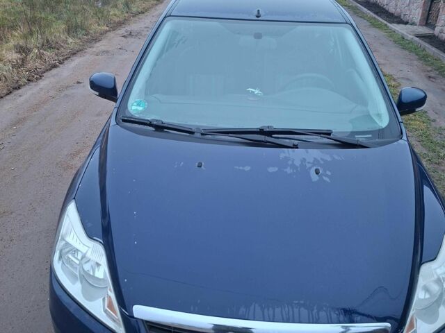 Синий Форд Фокус, объемом двигателя 1.6 л и пробегом 232 тыс. км за 5000 $, фото 1 на Automoto.ua