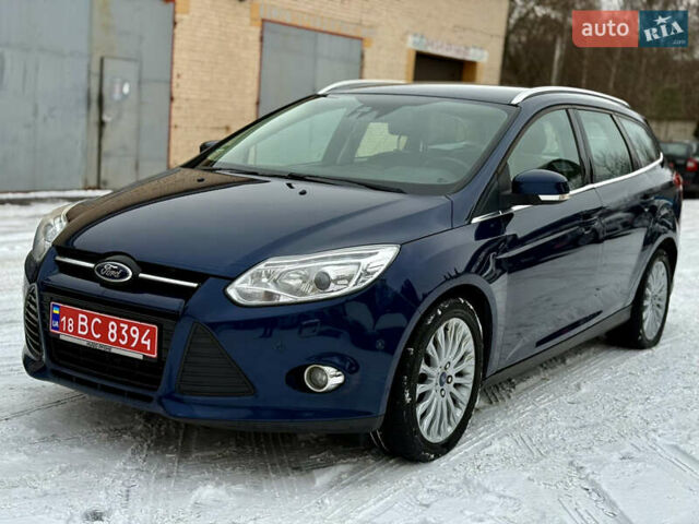 Синій Форд Фокус, об'ємом двигуна 1 л та пробігом 106 тис. км за 5499 $, фото 1 на Automoto.ua