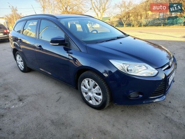 Синій Форд Фокус, об'ємом двигуна 1 л та пробігом 184 тис. км за 7500 $, фото 1 на Automoto.ua
