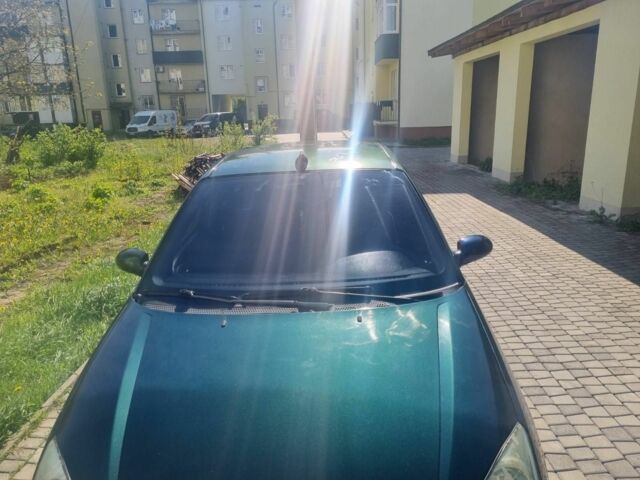 Зеленый Форд Фокус, объемом двигателя 1 л и пробегом 264 тыс. км за 1999 $, фото 1 на Automoto.ua