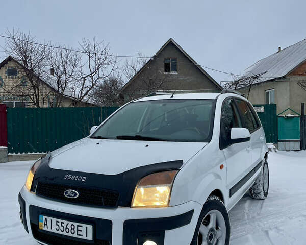 Білий Форд Фьюжен, об'ємом двигуна 1.4 л та пробігом 177 тис. км за 4999 $, фото 1 на Automoto.ua