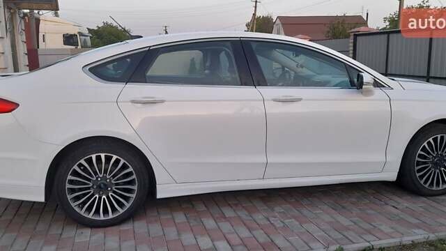 Белый Форд Фьюжн, объемом двигателя 2 л и пробегом 150 тыс. км за 14000 $, фото 1 на Automoto.ua