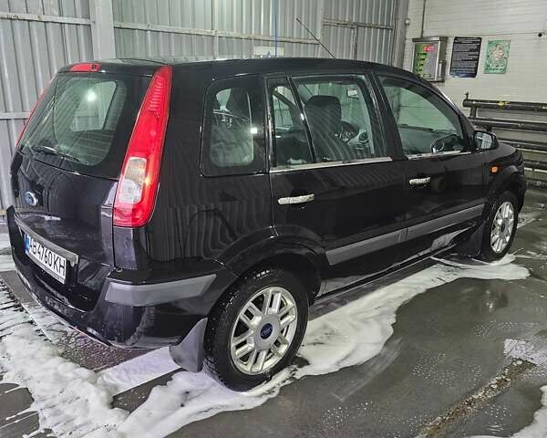 Черный Форд Фьюжн, объемом двигателя 1.4 л и пробегом 111 тыс. км за 4800 $, фото 1 на Automoto.ua