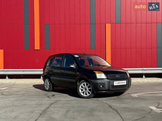 Черный Форд Фьюжн, объемом двигателя 1.4 л и пробегом 235 тыс. км за 4290 $, фото 1 на Automoto.ua