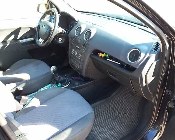 Черный Форд Фьюжн, объемом двигателя 1.6 л и пробегом 312 тыс. км за 4500 $, фото 1 на Automoto.ua