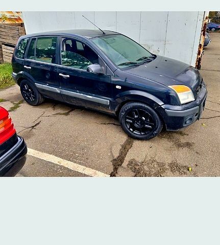 Черный Форд Фьюжн, объемом двигателя 1.4 л и пробегом 235 тыс. км за 2250 $, фото 1 на Automoto.ua