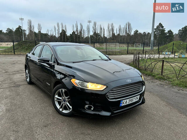 Черный Форд Фьюжн, объемом двигателя 2 л и пробегом 255 тыс. км за 12200 $, фото 1 на Automoto.ua