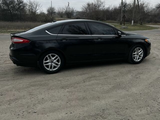 Черный Форд Фьюжн, объемом двигателя 2.5 л и пробегом 212 тыс. км за 9800 $, фото 1 на Automoto.ua