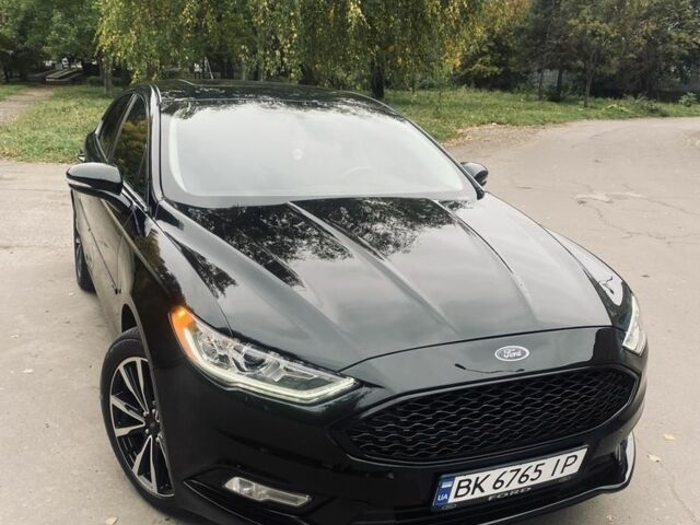 Черный Форд Фьюжн, объемом двигателя 2 л и пробегом 210 тыс. км за 12600 $, фото 1 на Automoto.ua