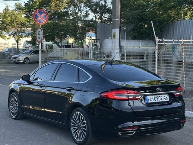 Черный Форд Фьюжн, объемом двигателя 2 л и пробегом 147 тыс. км за 13300 $, фото 1 на Automoto.ua