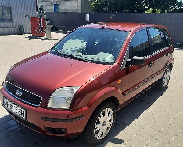 Красный Форд Фьюжн, объемом двигателя 1.4 л и пробегом 165 тыс. км за 3900 $, фото 1 на Automoto.ua