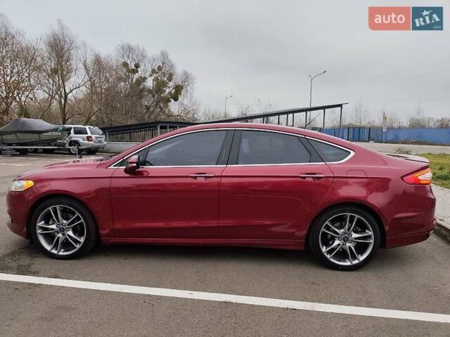 Красный Форд Фьюжн, объемом двигателя 2 л и пробегом 204 тыс. км за 15000 $, фото 1 на Automoto.ua