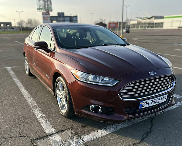 Червоний Форд Фьюжен, об'ємом двигуна 2 л та пробігом 125 тис. км за 13000 $, фото 1 на Automoto.ua