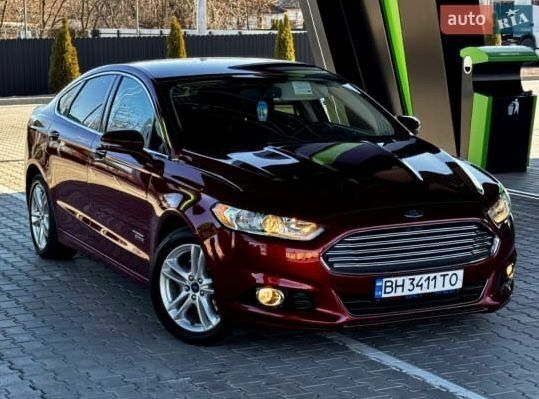 Красный Форд Фьюжн, объемом двигателя 2 л и пробегом 220 тыс. км за 12500 $, фото 1 на Automoto.ua