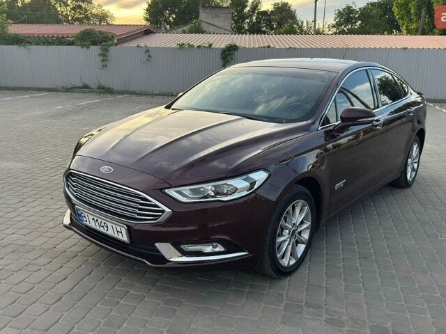 Червоний Форд Фьюжен, об'ємом двигуна 2 л та пробігом 150 тис. км за 14950 $, фото 1 на Automoto.ua