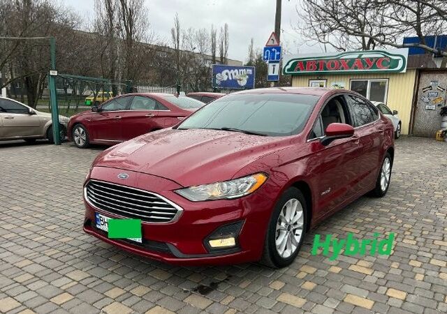 Червоний Форд Фьюжен, об'ємом двигуна 2 л та пробігом 217 тис. км за 12999 $, фото 1 на Automoto.ua