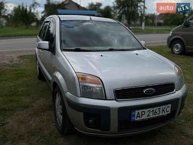 Серый Форд Фьюжн, объемом двигателя 1.6 л и пробегом 297 тыс. км за 4600 $, фото 1 на Automoto.ua