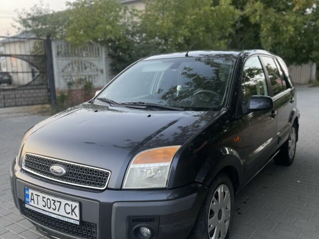 Серый Форд Фьюжн, объемом двигателя 1.4 л и пробегом 280 тыс. км за 3700 $, фото 1 на Automoto.ua