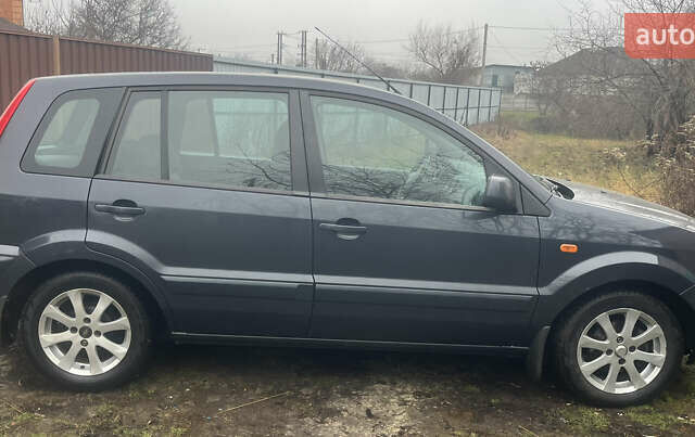 Серый Форд Фьюжн, объемом двигателя 1.4 л и пробегом 139 тыс. км за 5600 $, фото 1 на Automoto.ua