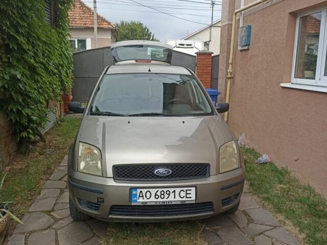 Серый Форд Фьюжн, объемом двигателя 1.4 л и пробегом 270 тыс. км за 4600 $, фото 1 на Automoto.ua