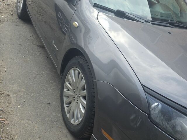 Серый Форд Фьюжн, объемом двигателя 2.5 л и пробегом 140 тыс. км за 3500 $, фото 1 на Automoto.ua