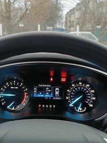 Серый Форд Фьюжн, объемом двигателя 1.6 л и пробегом 230 тыс. км за 8844 $, фото 1 на Automoto.ua