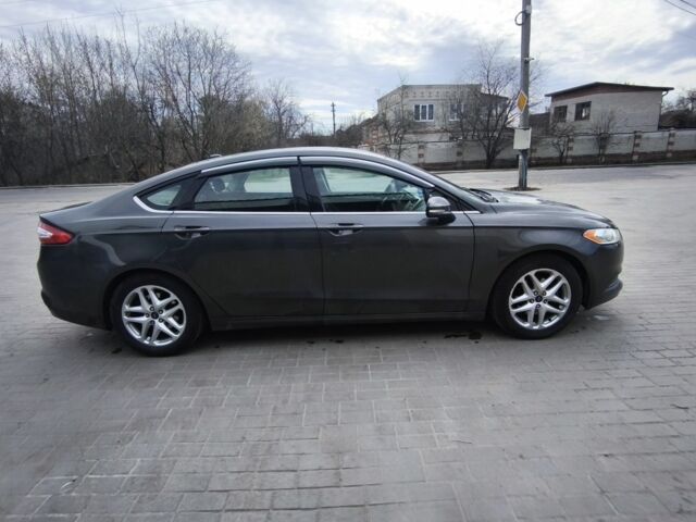 Серый Форд Фьюжн, объемом двигателя 2.5 л и пробегом 230 тыс. км за 10500 $, фото 1 на Automoto.ua