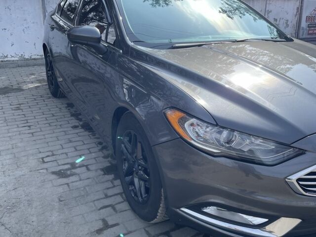 Серый Форд Фьюжн, объемом двигателя 2.5 л и пробегом 175 тыс. км за 13774 $, фото 1 на Automoto.ua