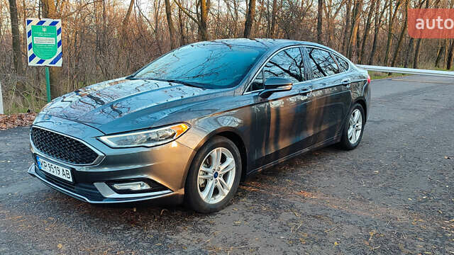 Серый Форд Фьюжн, объемом двигателя 2 л и пробегом 316 тыс. км за 12800 $, фото 1 на Automoto.ua