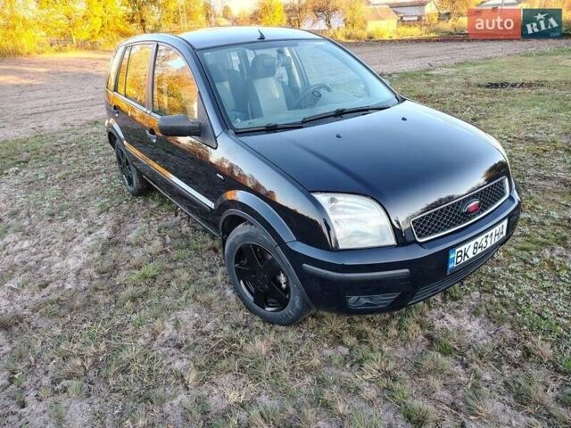 Синій Форд Фьюжен, об'ємом двигуна 1.4 л та пробігом 255 тис. км за 4200 $, фото 1 на Automoto.ua