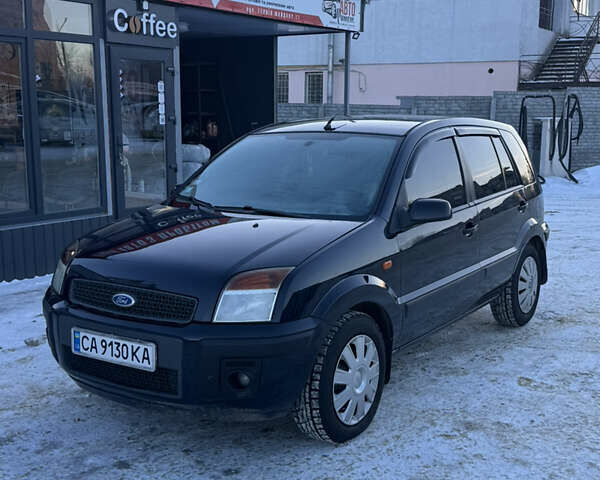 Синій Форд Фьюжен, об'ємом двигуна 1.4 л та пробігом 269 тис. км за 4900 $, фото 1 на Automoto.ua