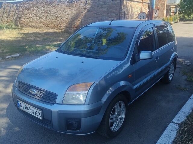Синій Форд Фьюжен, об'ємом двигуна 1.39 л та пробігом 147 тис. км за 4700 $, фото 1 на Automoto.ua