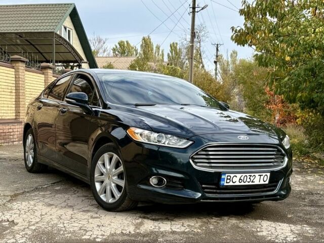Синий Форд Фьюжн, объемом двигателя 2 л и пробегом 212 тыс. км за 9850 $, фото 1 на Automoto.ua