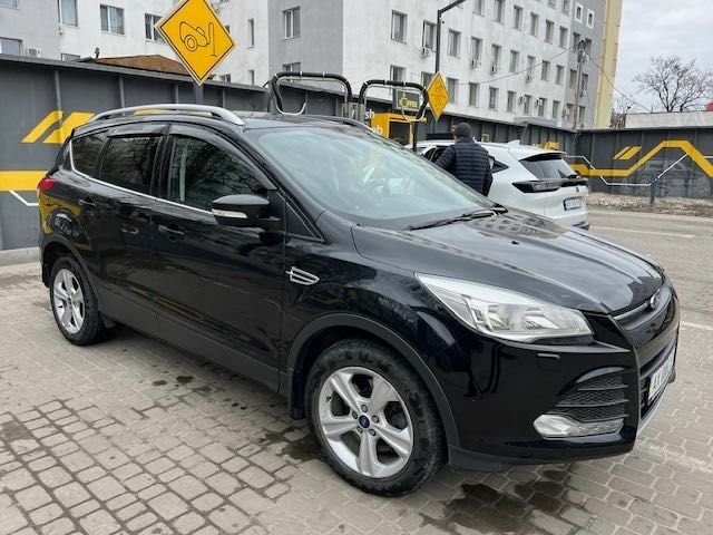 Чорний Форд Куга, об'ємом двигуна 2 л та пробігом 105 тис. км за 16199 $, фото 1 на Automoto.ua