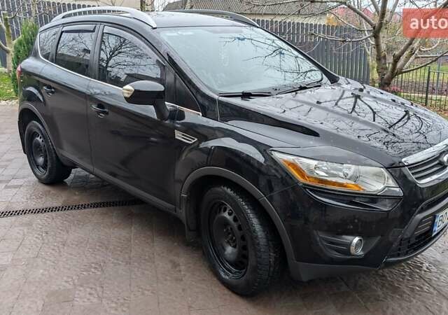 Черный Форд Куга, объемом двигателя 2 л и пробегом 150 тыс. км за 13500 $, фото 1 на Automoto.ua