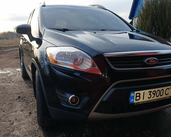 Черный Форд Куга, объемом двигателя 2 л и пробегом 124 тыс. км за 12500 $, фото 1 на Automoto.ua