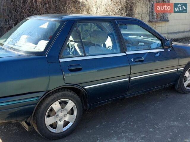 Синий Форд Меркури, объемом двигателя 1.9 л и пробегом 305 тыс. км за 1400 $, фото 1 на Automoto.ua