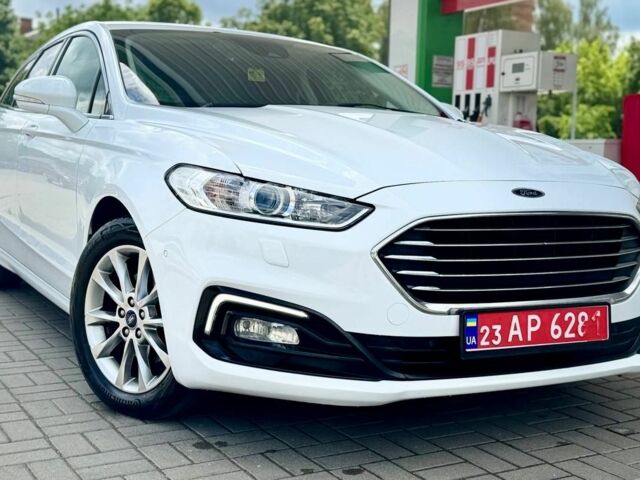 Белый Форд Мондео, объемом двигателя 2 л и пробегом 234 тыс. км за 13799 $, фото 1 на Automoto.ua