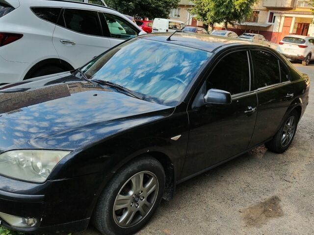 Чорний Форд Мондео, об'ємом двигуна 2 л та пробігом 310 тис. км за 4300 $, фото 1 на Automoto.ua