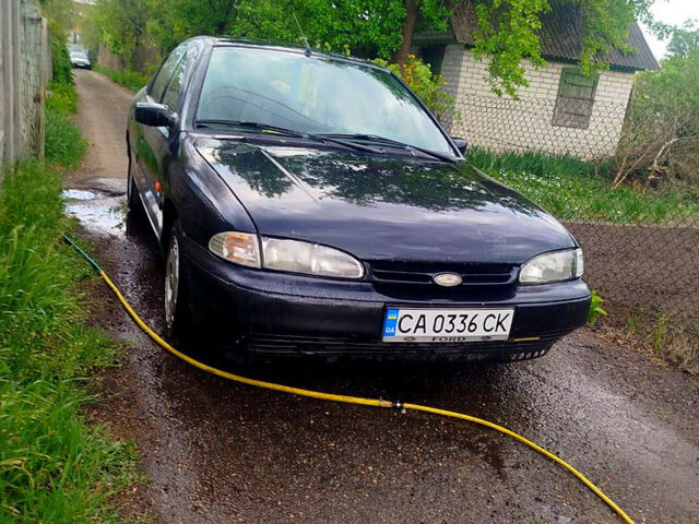 Черный Форд Мондео, объемом двигателя 1.8 л и пробегом 398 тыс. км за 1400 $, фото 1 на Automoto.ua
